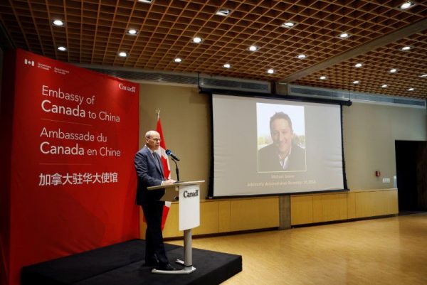 China court convicts Canadian to 11 years in prison in espionage case