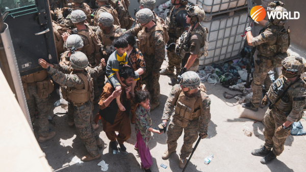 Gunfire at Kabul airport kills 1 amid chaotic evacuations
